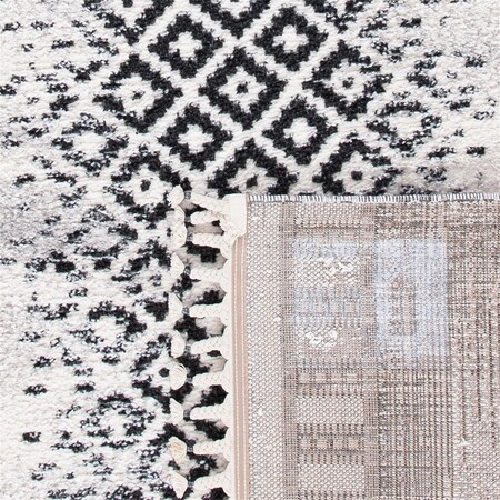 Safavieh 5 ft. -5 in. x 7 ft. -7 in. Moroccan Tassel Shag Bohemian Rectangle Machine-Made Rug Ivory & Beige MTS483B-5